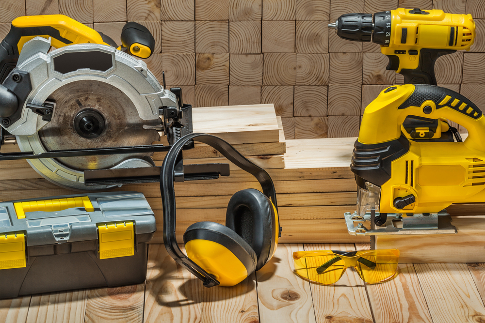 Construction,carpentry,electric,hand,tools,on,wooden,background